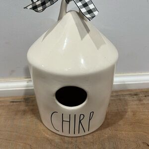 White Ceramic Birdhouse with 'Chirp' Text